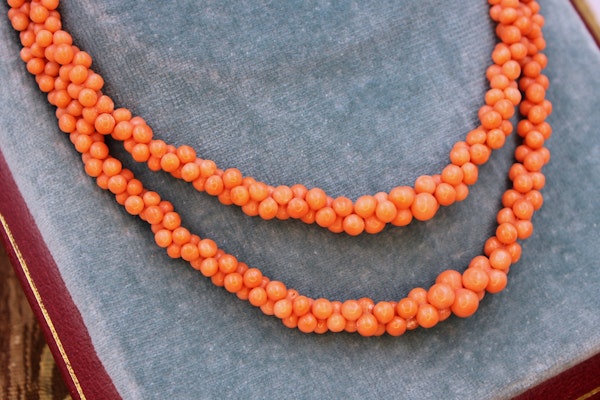 A natural Coral graduated double row necklace with a Coral and 9ct Yellow Gold Clasp, Circa 1940 - image 2