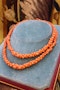 A natural Coral graduated double row necklace with a Coral and 9ct Yellow Gold Clasp, Circa 1940 - image 1