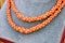 A natural Coral graduated double row necklace with a Coral and 9ct Yellow Gold Clasp, Circa 1940 - image 3