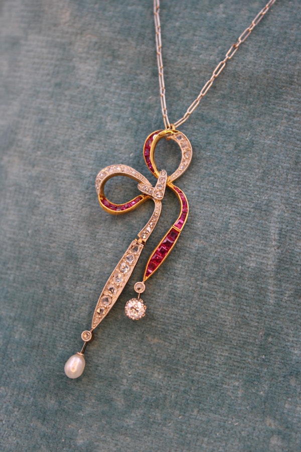 A Diamond, Ruby & Pearl Bow Pendant set in 18ct Yellow Gold and Platinum, Circa 1915 - image 2