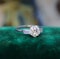 A Beautiful 1.04 Carat, Art Deco, Diamond Solitaire Engagement Ring, with Baguette-cut Diamond  Shoulders, set in Platinum.  Circa 1930 - image 3