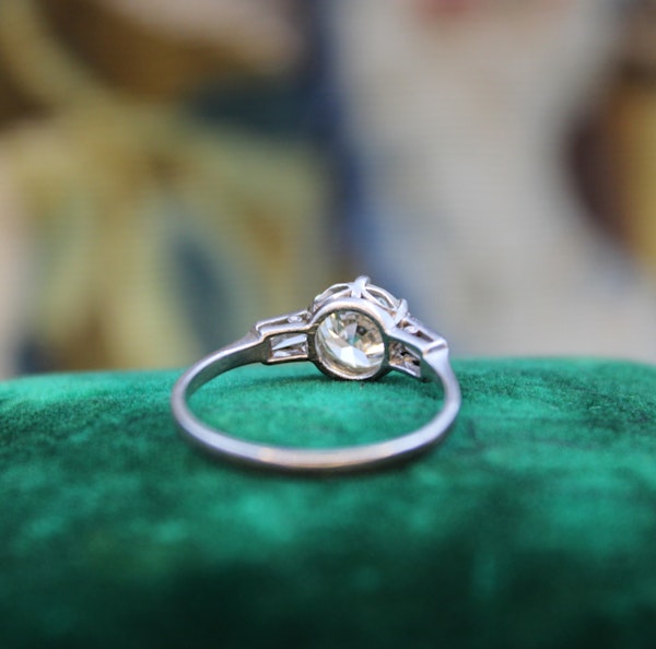 A Beautiful 1.04 Carat, Art Deco, Diamond Solitaire Engagement Ring, with Baguette-cut Diamond  Shoulders, set in Platinum.  Circa 1930 - image 4