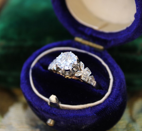 A Beautiful, 0.85 Carat Diamond Solitaire Engagement Ring, with detailed Diamond set Foliate Shoulders, Plausibly English, Circa 1920 - image 1