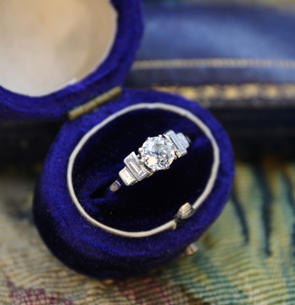 An Art Deco 0.73 Carat Diamond Engagement Ring, with Classic "Stepped" Diamond Shoulders, set in Platinum, English, Circa 1930 - image 1