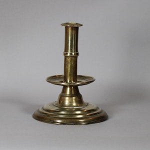 Brass trumpet-form candlestick, 17th century