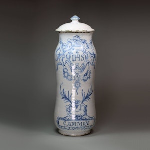 Spanish blue and white faience albarello and cover, dated 1773