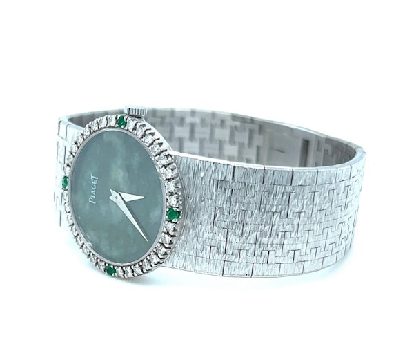 A Unique PIAGET Bracelet Watch Circa 1990 With Diamonds&Emeralds In 18/K White Gold - image 1