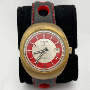 Sicura jewel 17 red brass and leather strap 1970s