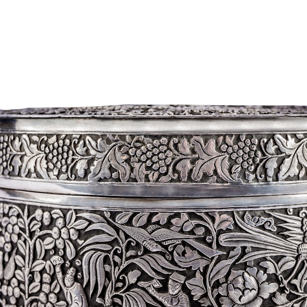 A fine mid-nineteenth century Chinese Straits silver repousse cylindrical lidded box - image 4