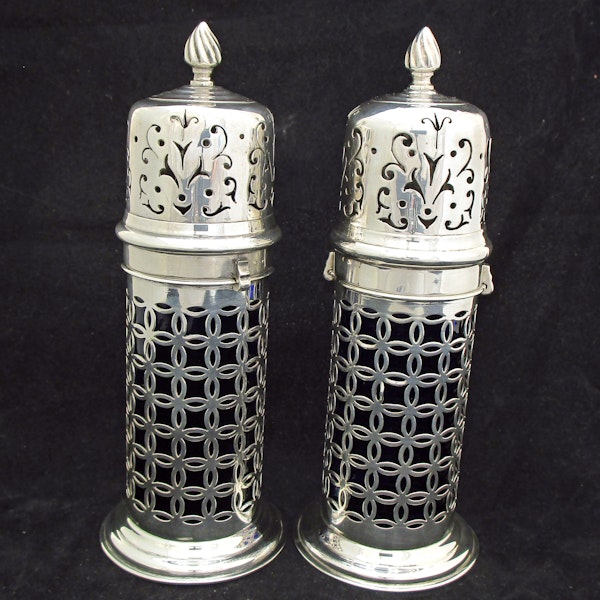 A rare pair of silver sugar shakers with blue liners. - image 3