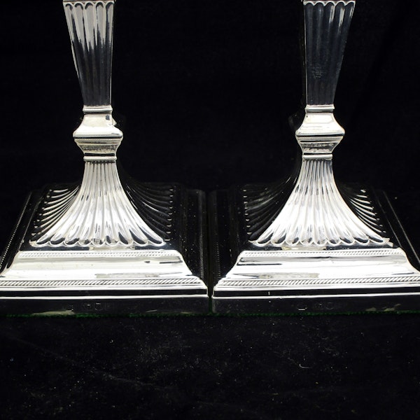A pair of sterling silver Georgian style candle sticks. - image 7