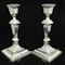A pair of sterling silver Georgian style candle sticks. - image 1