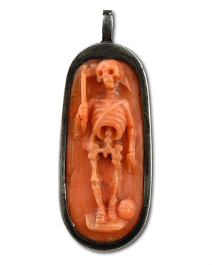 Silver pendant with a coral memento mori cameo. Italian, late 17th century.