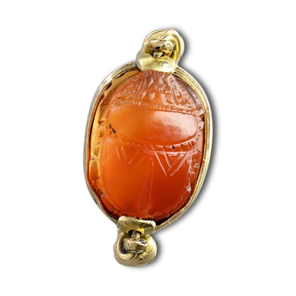 Gold ring with an Etruscan carnelian scarab of a figure carrying an amphora. - image 6