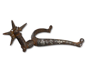 Iron and silver rowel spur. English or German, 17th century.
