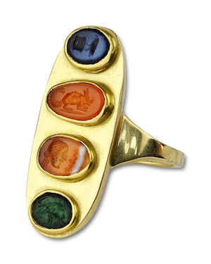 Gold ring set with four Ancient and Renaissance hardstone intaglios.