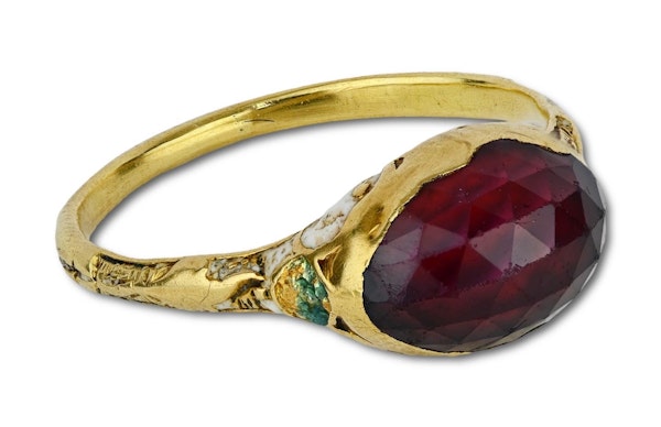 Gold and enamel ring set with a faceted garnet. English, 17th century. - image 1