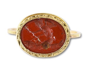 Gold ring with a rare ancient jasper intaglio of Eros riding a giant phallus.