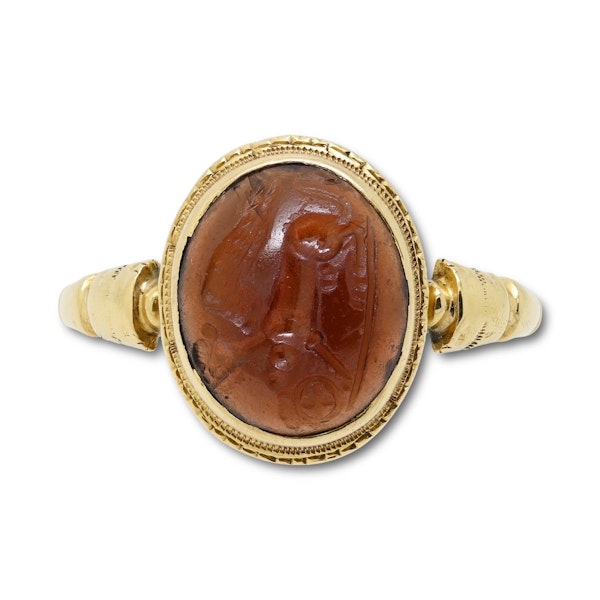Gold ring with a cabochon garnet intaglio of a sphinx. Roman, 1st - 2nd century. - image 12
