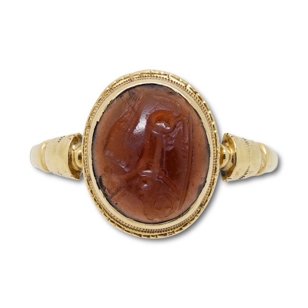 Gold ring with a cabochon garnet intaglio of a sphinx. Roman, 1st - 2nd century. - image 11