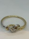 Stylish 18ct yellow and white gold knot bangle at Deco&Vintage Ltd - image 5