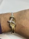 Stylish 18ct yellow and white gold knot bangle at Deco&Vintage Ltd - image 4