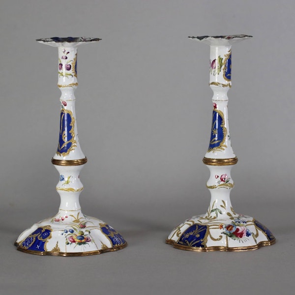 A pair of 18th century South Staffordshire, probably Bilston, enamel table candlesticks - image 1