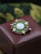 A very finely worked Opal, Colombian Emerald, Burmese Ruby & Diamond, 18ct Yellow Gold Brooch, attributed to Harvey & Gore (London). Circa 1890. - image 3