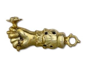 Silver gilt pomander pendant in the form of a figa. German, early 17th century.