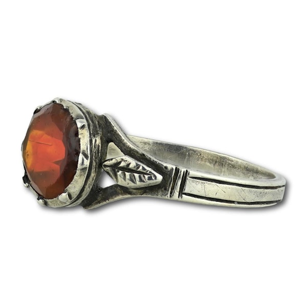 Silver ring set with a vibrant orange paste. French, late 18th century. - image 7