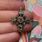 A gold and silver cross set with table cut emeralds and diamonds.  Spanish, early 18th century. - image 7
