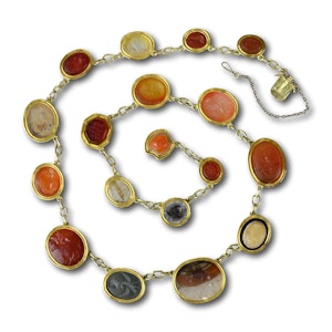 Classical revival necklace set with eighteen ancient hardstone intaglios set in high carat gold.  Roman, 2nd century BC - 2nd century AD.