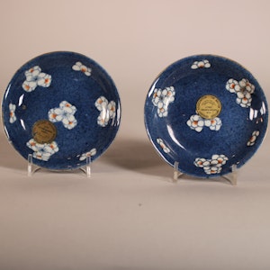 Pair of Chinese powder blue ground saucers, Kangxi (1662-1722)