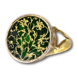 Gold ring set with a Thewa green glass plaque. English and Indian, 19th century.