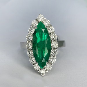Large Emerald (5ct) & Diamond (1.60) Marquise Ring. SADDINGTONS JEWELLERY STAND 375