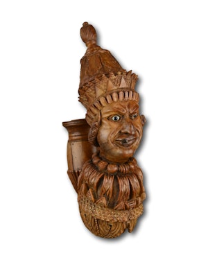 An amusing figural coquilla pipe. French Colonies, early 19th century.