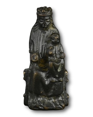 Bronze figure of the seated Madonna and child. English or German, 14th century.