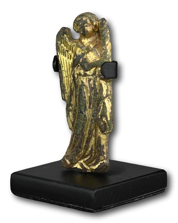 A gilt bronze figure of candle bearing angel. Probably French, 14th century. - image 8