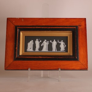 A framed Wedgwood jasperware muses plaque, 19th century