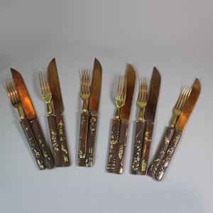 Set of six Japanese gilt-steel knives and forks with kozuka handles, circa 1880
