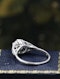 A very fine Platinum & Diamond Solitaire Ring, set with an Old European Cut Diamond, of 2.18 Carats, G Colour and SI1 Clarity. Offset by graduated Diamond Shoulders. Circa 1925 - image 4