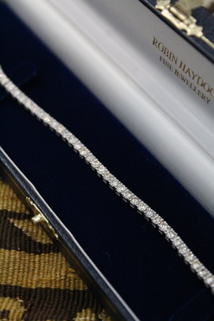 Downstairs at Grays: A very fine Diamond Line Bracelet in 18 Ct. White Gold, with a Double Safety Catch. Pre Owned.
