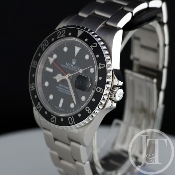 Rolex GMT Master II 16710 Black Bezel 2005 with Box & Papers - image 2