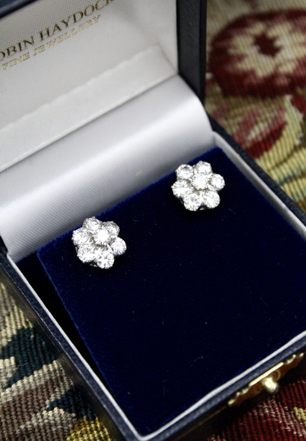 A lively pair of High Clarity, 2.80 Carat Diamond Cluster Earrings, in 14ct White Gold, Circa 1970 - image 1