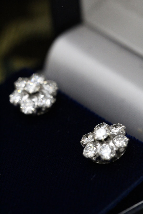 A lively pair of High Clarity, 2.80 Carat Diamond Cluster Earrings, in 14ct White Gold, Circa 1970 - image 2