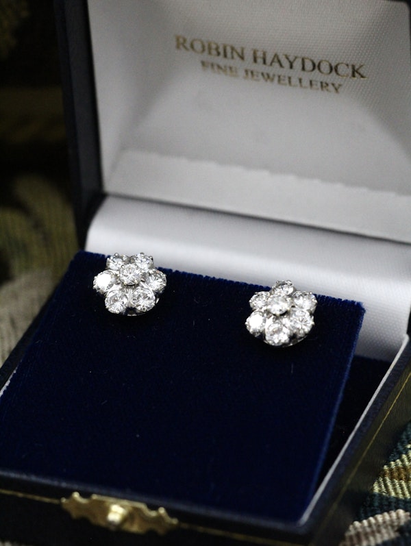 A lively pair of High Clarity, 2.80 Carat Diamond Cluster Earrings, in 14ct White Gold, Circa 1970 - image 3