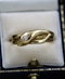 A very fine 18ct Yellow Gold Diamond Snake Ring, by W Wilkinson Ltd. London, Circa 1934 - image 2