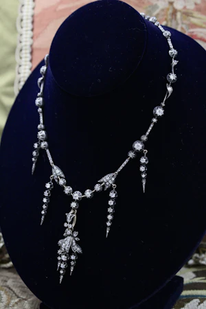 Downstairs at Grays: A very Beautiful Victorian Diamond Necklace in the Foliate Groseilliere style, in 18ct Yellow gold and Silver in the form of an intermittent Riviere,   French, Circa 1870
