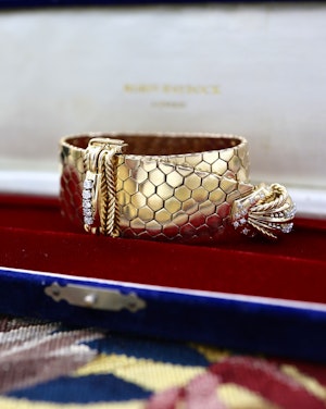 Downstairs at Grays: A very fine 18 carat Yellow Gold, 122.68 g. Tassel Cuff (Bracelet), with Diamonds. French. Circa  1950