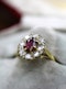A very fine 18ct Yellow & White Gold Oval 1.35 Carat Siam Ruby & Diamond Cluster Ring. Circa 1975 - image 2
